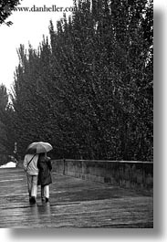 black and white, conceptual, couples, emotions, europe, france, paris, people, romantic, umbrellas, vertical, walking, photograph