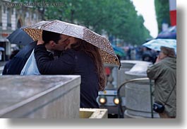 conceptual, emotions, europe, france, horizontal, kissing, lovers, paris, people, romantic, umbrellas, photograph