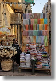 images/Africa/Egypt/Aswan/Misc/man-w-colorful-hats.jpg