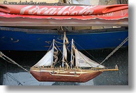 images/Africa/Egypt/Aswan/Misc/wooden-model-ship-n-coca_cola.jpg