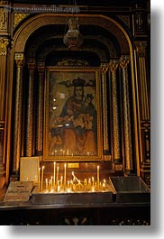 images/Africa/Egypt/Cairo/Coptic/candles-n-old-painting.jpg