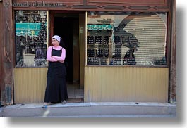 images/Africa/Egypt/Cairo/OldTown/girl-at-shop-door.jpg