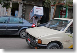 images/Africa/Egypt/Cairo/OldTown/man-carrying-freezer.jpg