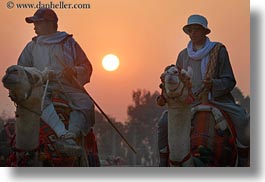 images/Africa/Egypt/Cairo/People/men-on-camels-n-sun-01.jpg