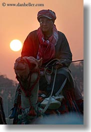 images/Africa/Egypt/Cairo/People/men-on-camels-n-sun-03.jpg