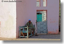 images/Africa/Egypt/Edfu/man-smoking-on-bench.jpg
