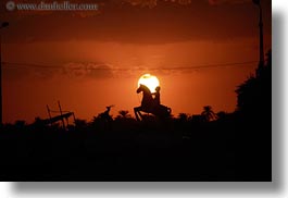 images/Africa/Egypt/Misc/man-on-horse-statue-n-sunset-03.jpg
