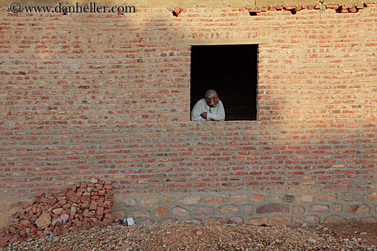 old-man-in-brick-house-window-03.jpg