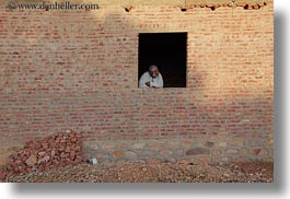 images/Africa/Egypt/NubianVillage/old-man-in-brick-house-window-03.jpg