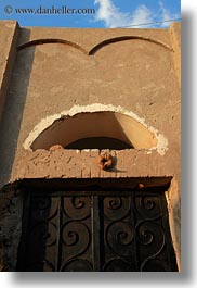 images/Africa/Egypt/NubianVillage/rams-horns-over-door.jpg