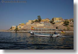 images/Africa/Egypt/River/motorboat-by-cliff-bldgs-02.jpg