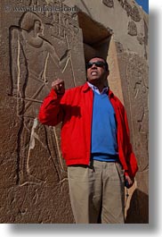 images/Africa/Egypt/WtPeople/Ahmed/ahmed-talking-by-bas_relief-01-ka-gemni-tomb-01.jpg