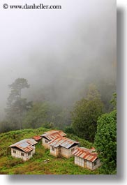 images/Asia/Bhutan/DochulaPass/house-in-fog-01.jpg