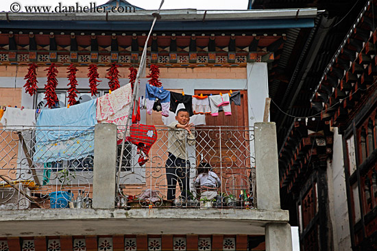 boy-waving-from-balcony.jpg