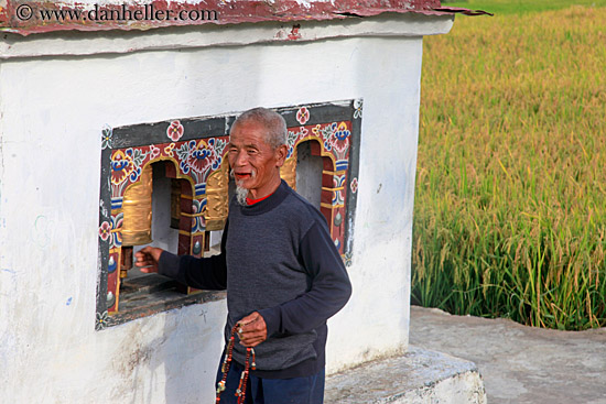 man-turning-prayer-wheel-01.jpg