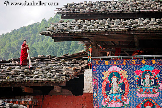 monk-on-tile-roof-by-tapestry.jpg