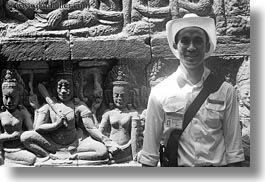 images/Asia/Cambodia/AngkorThom/LeperKingTerrace/tour-guide-n-statues-1.jpg