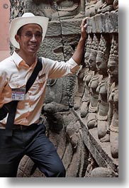 images/Asia/Cambodia/AngkorThom/LeperKingTerrace/tour-guide-n-statues-2.jpg