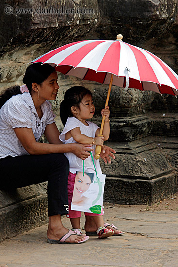 girl-w-red-white-striped-umbrella-1.jpg