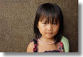 images/Asia/Cambodia/AngkorWat/People/Kids/young-girl-n-bas_relief.jpg