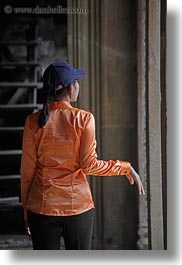 images/Asia/Cambodia/AngkorWat/People/Women/woman-in-orange-w-blue-baseball-cap.jpg