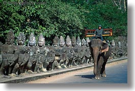 images/Asia/Cambodia/Gates/SouthGate/man-riding-elephant-1.jpg