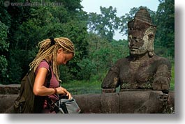 images/Asia/Cambodia/Gates/VictoryGate/woman-n-statue.jpg
