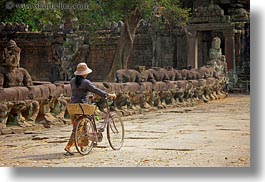 images/Asia/Cambodia/Gates/VictoryGate/woman-pushing-bike-2.jpg