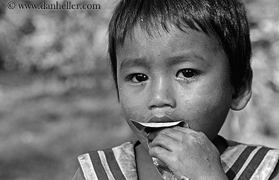 boy-eating-leaf-1-bw.jpg