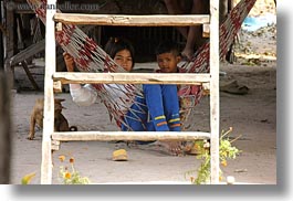 images/Asia/Cambodia/People/Girls/girl-n-boy-on-hammok-behind-ladder.jpg