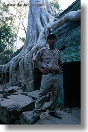 asia, cambodia, cambodian, guards, roots, ta promh, trees, vertical, photograph