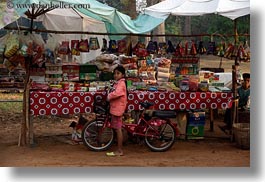 images/Asia/Cambodia/Transportation/girl-on-red-bike-by-market-stahl-2.jpg