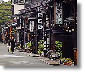 images/Asia/Japan/Takayama/People/guy-walking-by-shops-2.jpg
