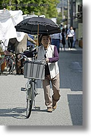 images/Asia/Japan/Takayama/People/woman-walking-bike-2.jpg