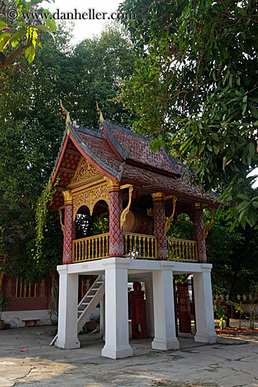 temple-by-trees-on-white-stilts-3.jpg