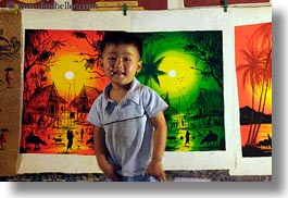 images/Asia/Laos/LuangPrabang/Market/boy-n-paintings.jpg