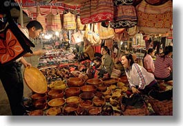 images/Asia/Laos/LuangPrabang/Market/man-buying-wood-bowls-01.jpg