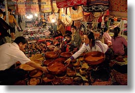 images/Asia/Laos/LuangPrabang/Market/man-buying-wood-bowls-02.jpg