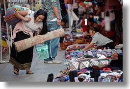 images/Asia/Laos/LuangPrabang/Market/woman-carrying-rolled-mat-01.jpg