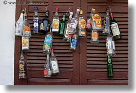 images/Asia/Laos/LuangPrabang/Misc/liquor-bottles-on-shutters.jpg