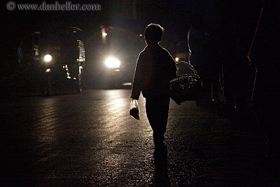 boy-carrying-basket-at-nite.jpg