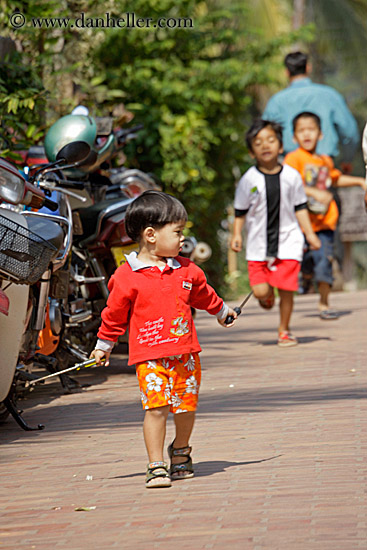 boy-in-red-w-motorcycles-3.jpg