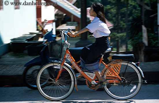 girl-on-orange-bike.jpg