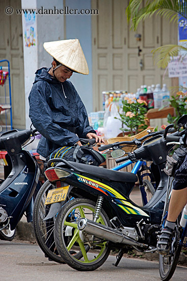 man-w-conical-hat-n-motorcycle.jpg