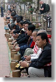 images/Asia/Laos/LuangPrabang/People/Men/men-w-rice-basket-offerings-1.jpg