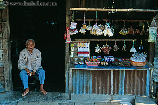 old-man-sitting-storefront.jpg