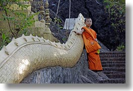 images/Asia/Laos/LuangPrabang/People/Monks/BoyAndStairs/monk-boy-at-snake-stairs-03.jpg