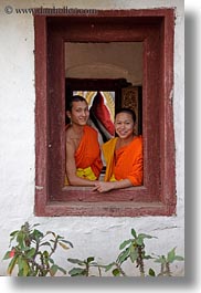 images/Asia/Laos/LuangPrabang/People/Monks/Twos/window-w-two-monks-2.jpg