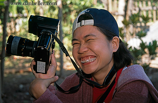 asian-photographer-showing-teeth.jpg