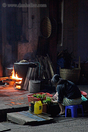 woman-handling-produce-by-fire.jpg